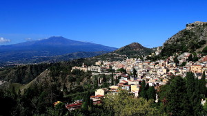 Mt_Etna_and_Taormina_as_seen_from_the_Ancient_Theatre_of_Taormina_(22290641726)